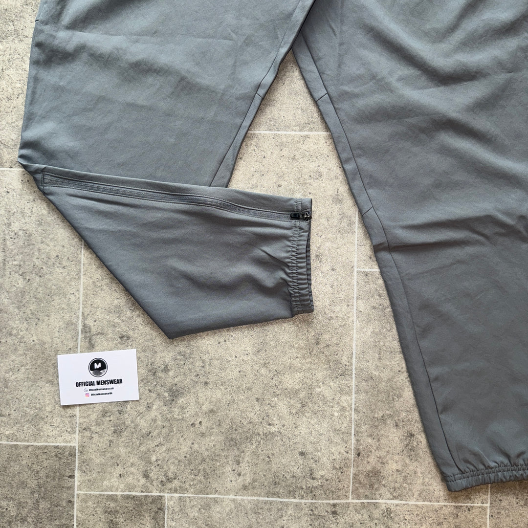 NIKE DRI-FIT CHALLENGER PANTS - GREY