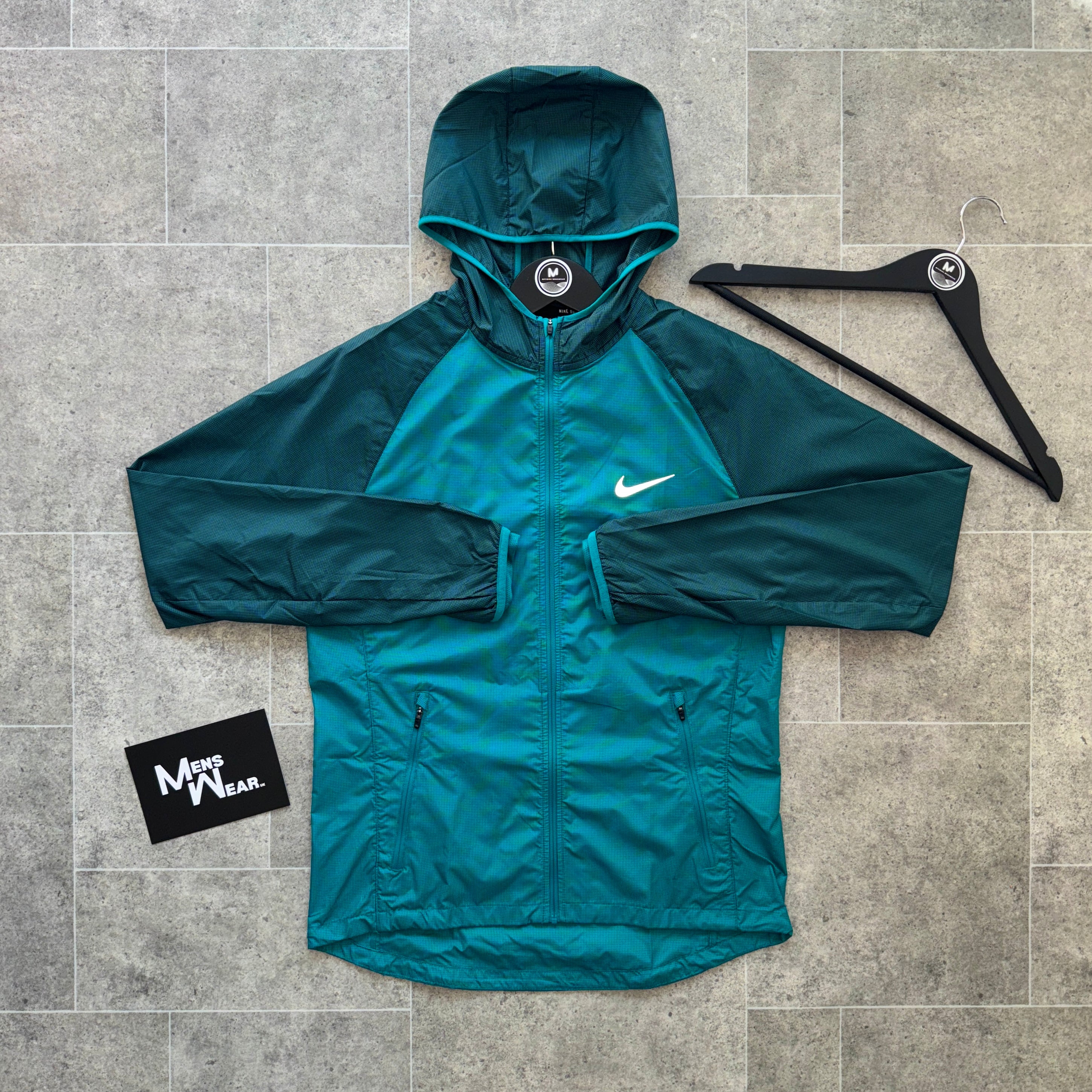 turquoise nike windbreaker