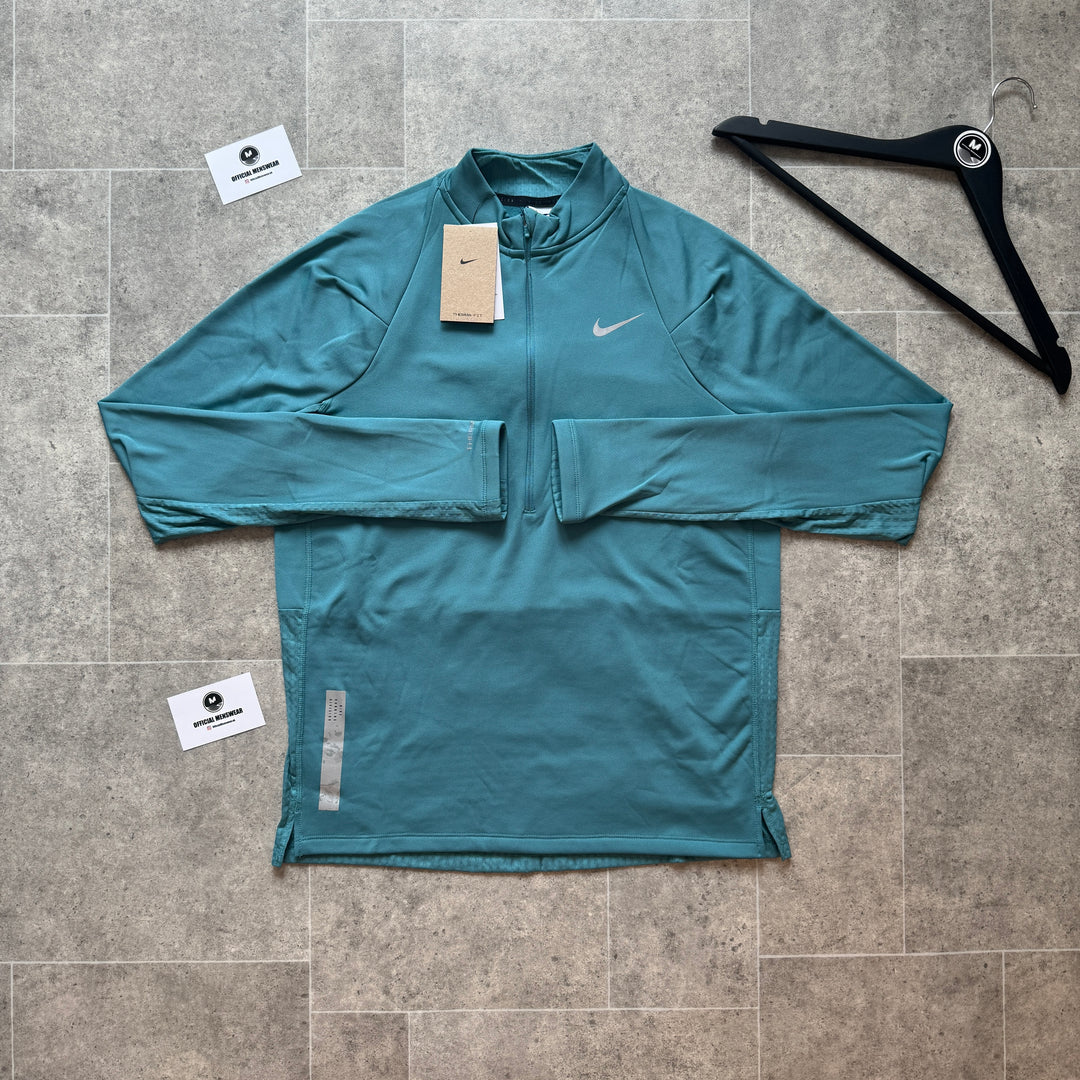 NIKE RUNNING DIVISION THERMA FIT 1/4 ZIP - TURQUOISE