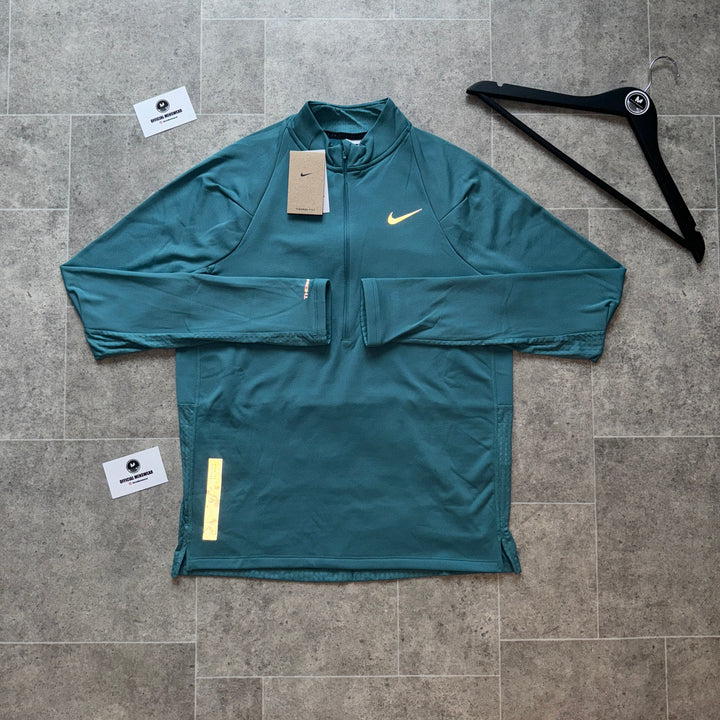 NIKE RUNNING DIVISION THERMA FIT 1/4 ZIP - TURQUOISE