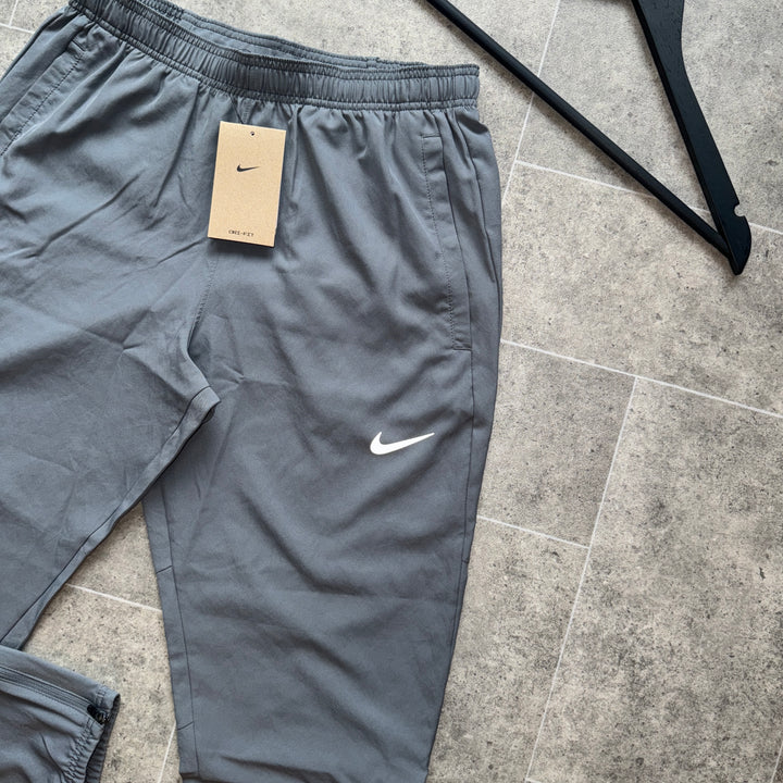 NIKE DRI-FIT PANTS - GREY