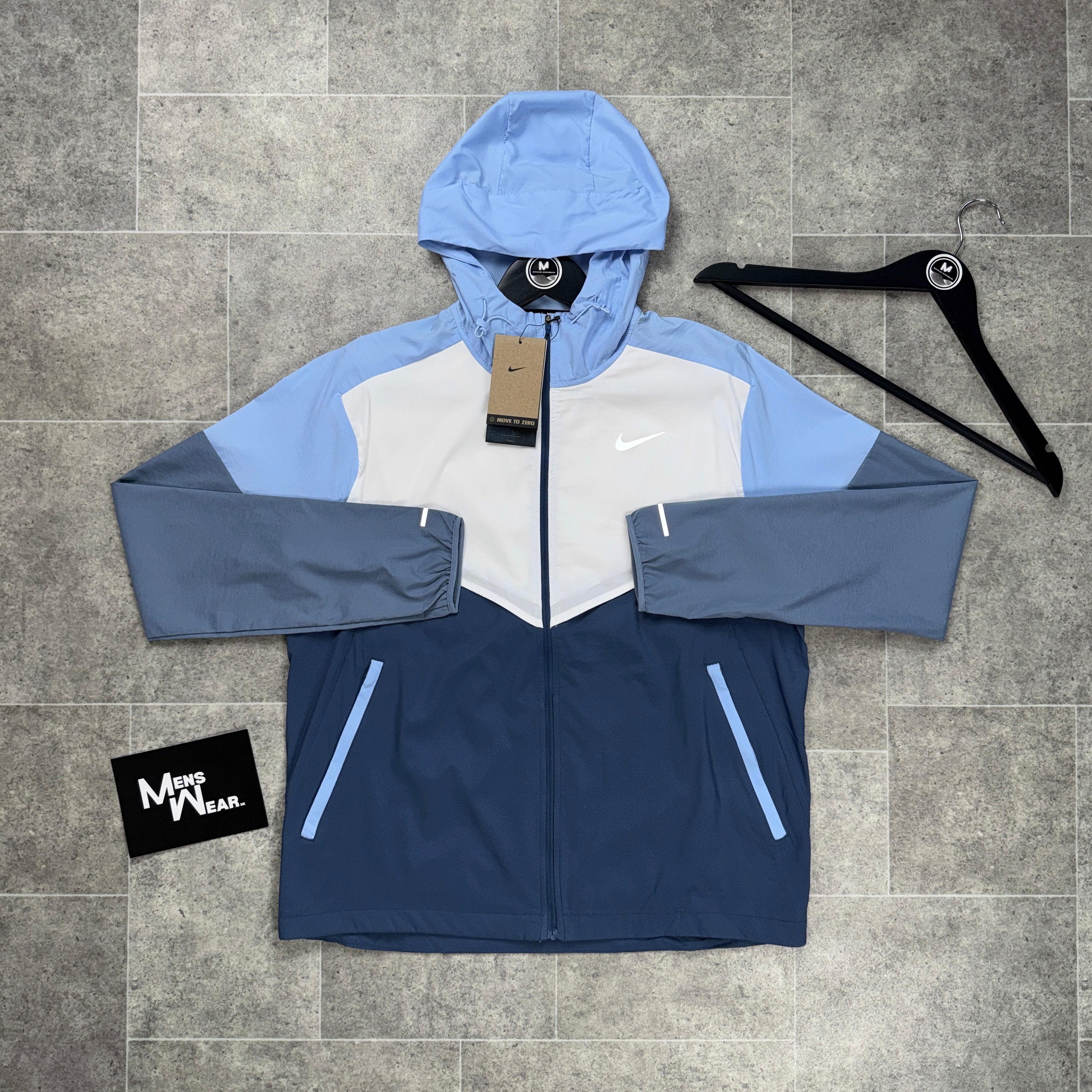 blue black and white nike windbreaker