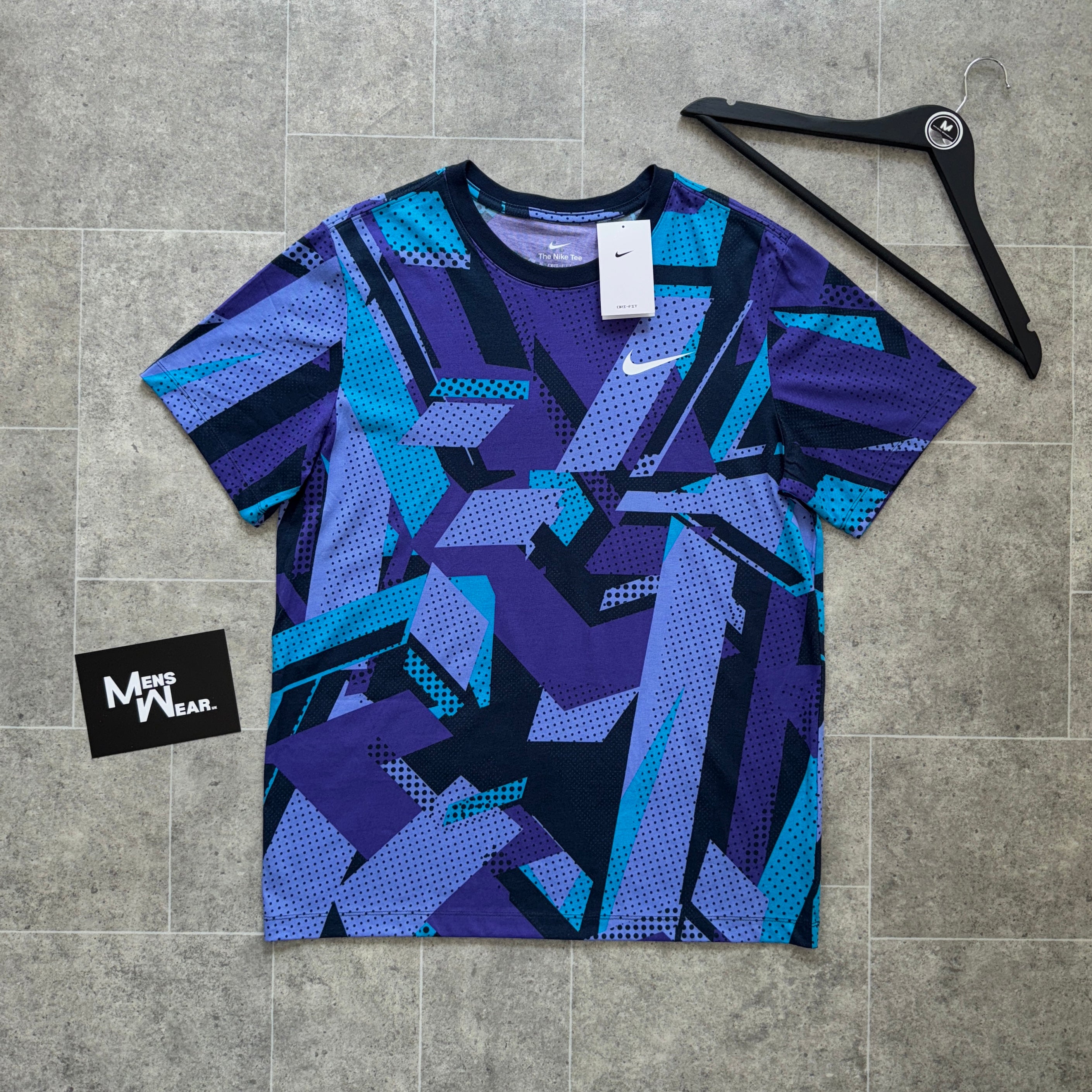 purple and blue nike shirt