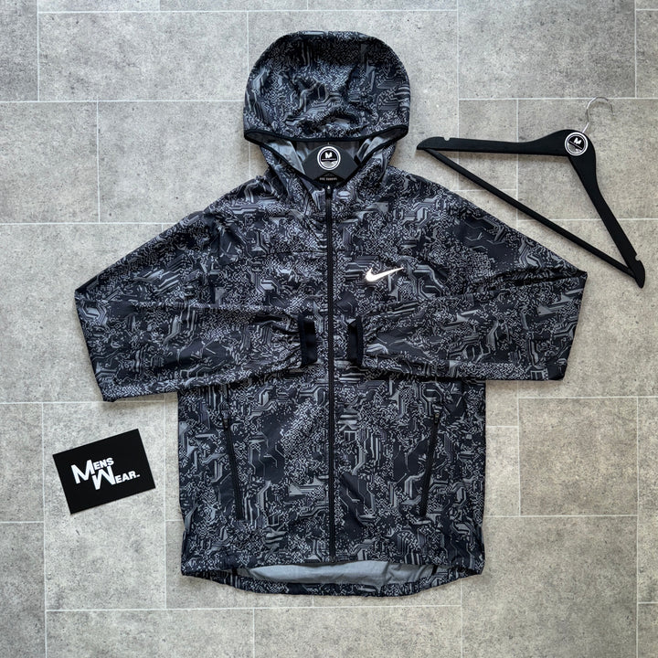 NIKE ‘EXCLUSIVE’ GLITCH WINDBREAKER - BLACK