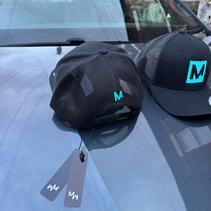 OFFICIAL MENSWEAR UK CAP - BLACK/TURQUOISE