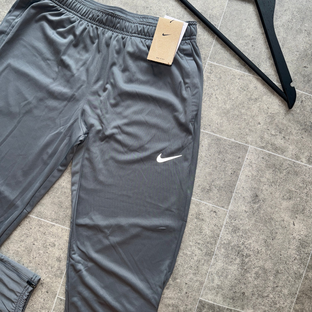 NIKE THERMA-FIT CHALLENGER PANTS - GREY