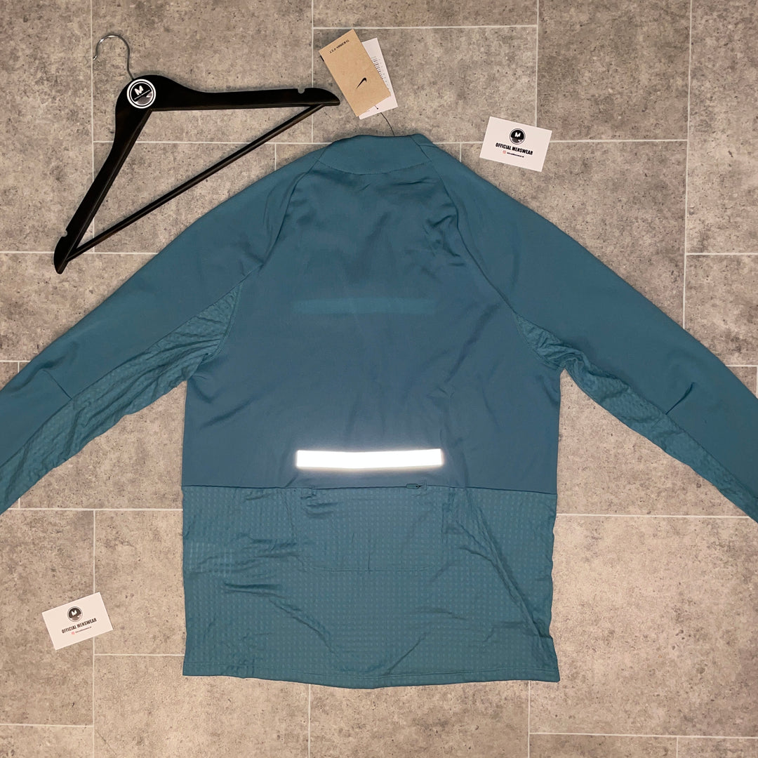 NIKE RUNNING DIVISION THERMA FIT 1/4 ZIP - TURQUOISE